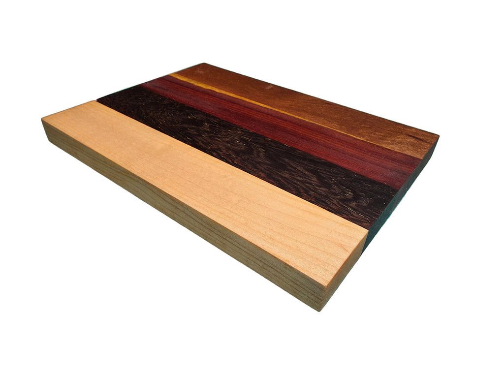 Handmade oak black palmwood pink ivory and kiaat cheese board luxury wooden serving board UK
