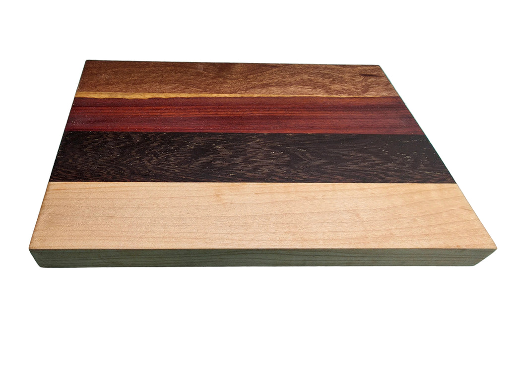 Oak black palmwood pink ivory and kiaat cheese board used for serving cheese and charcuterie