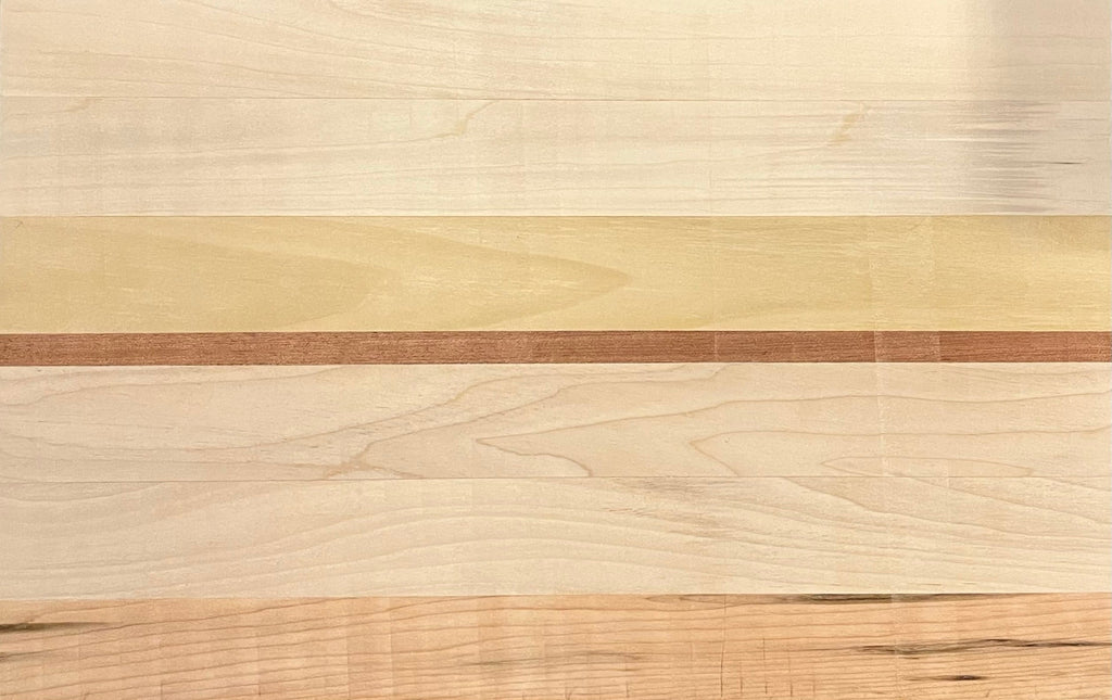 Close up of oak and walnut wood grain on premium chopping board