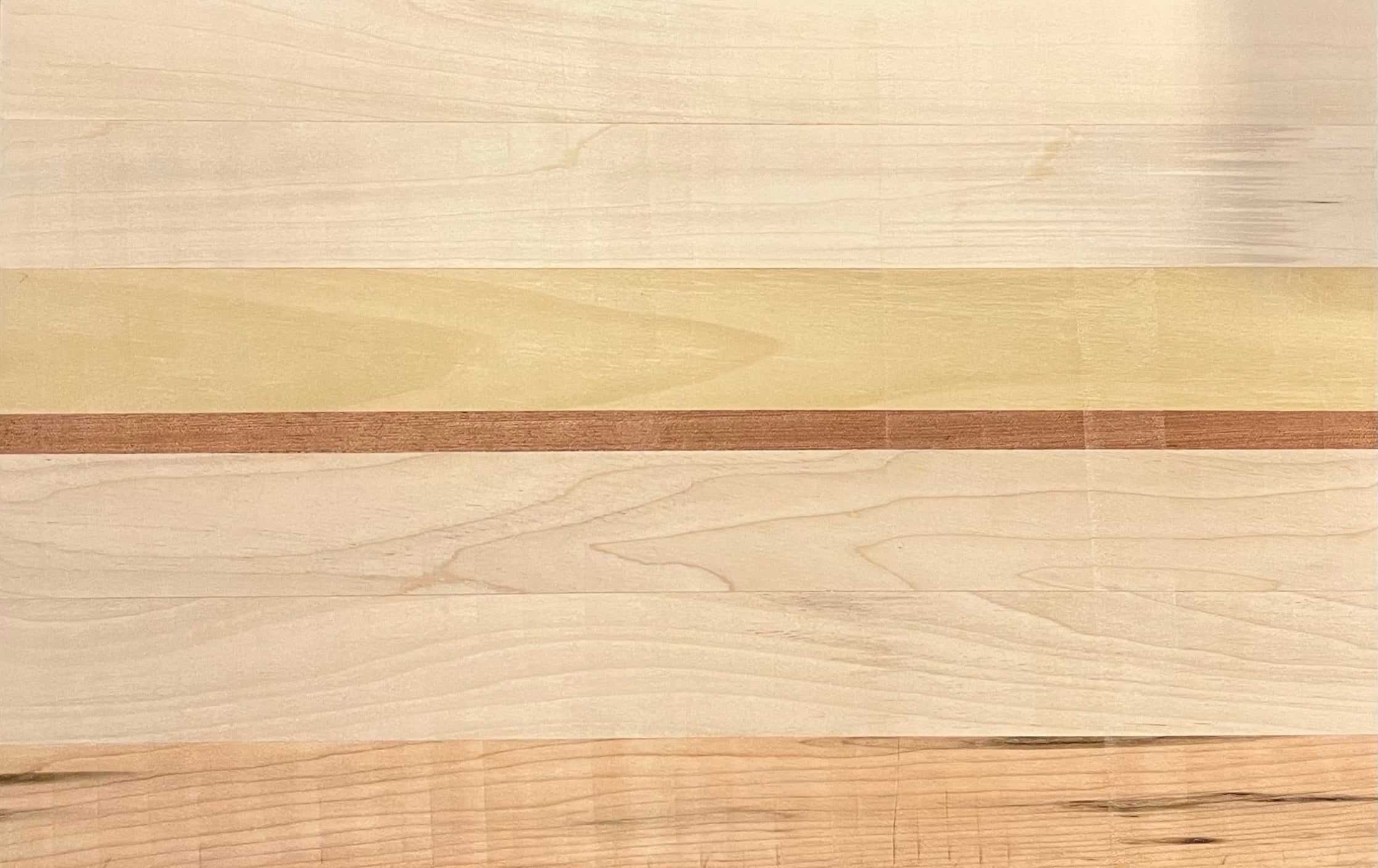 Close up of oak and walnut wood grain on premium chopping board