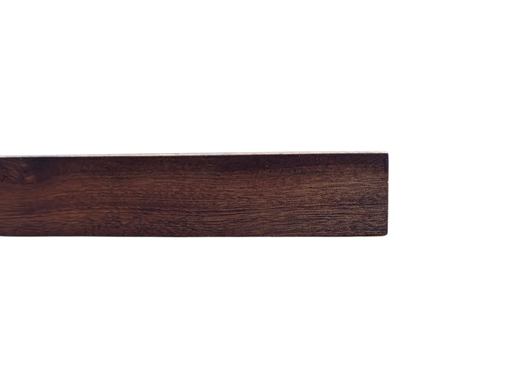 Sapele wooden chopping board used for serving bread and cheese