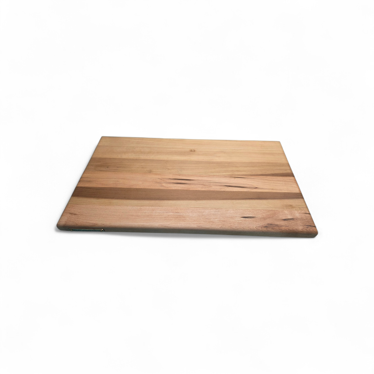 Solid oak chopping board 40cm x 30cm in use preparing food in kitchen