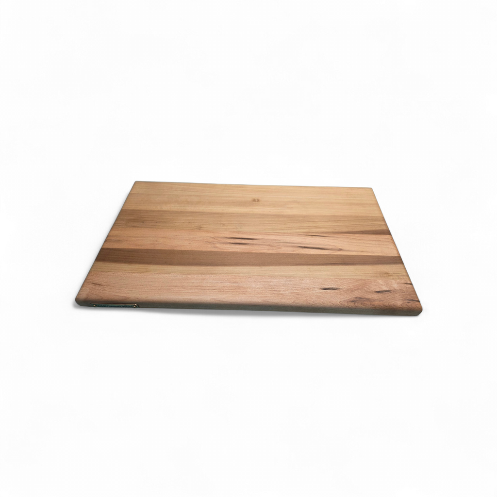 Solid oak chopping board 50cm x 30cm in use preparing food in kitchen