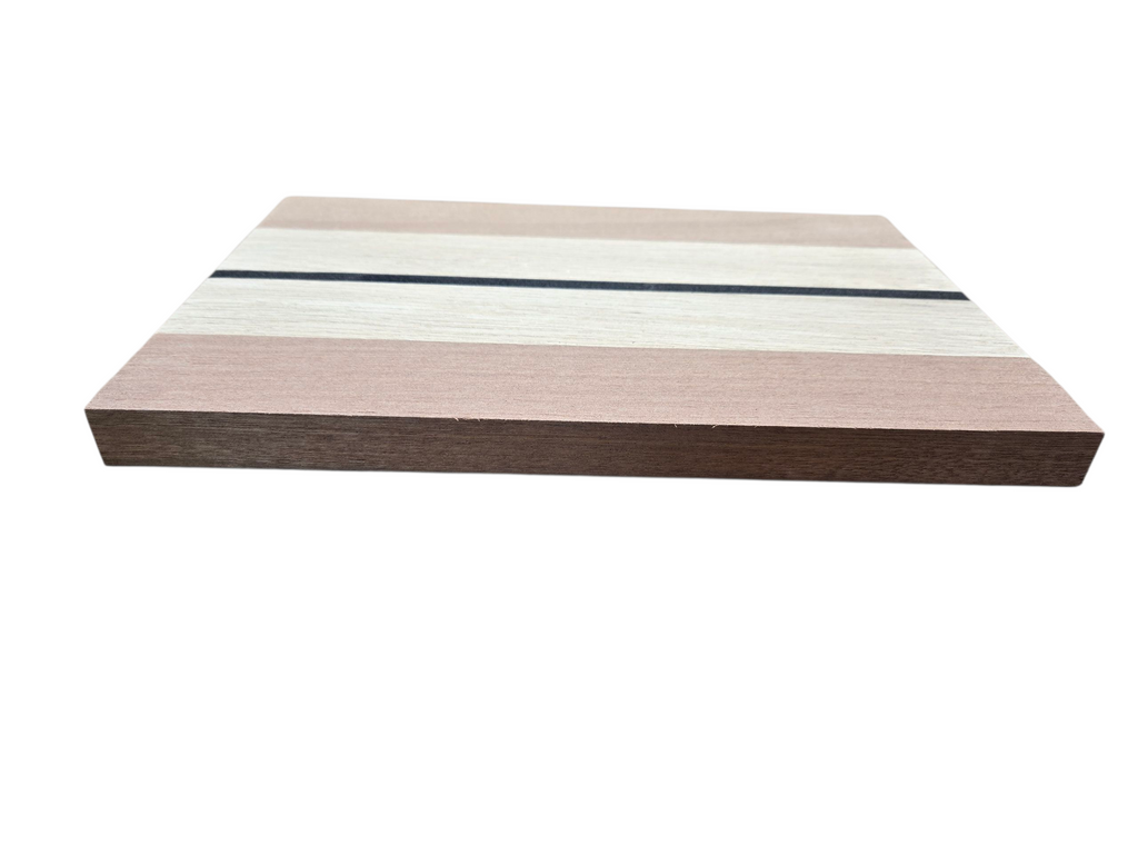 Walnut oak and ebony cheese board used for serving cheese and charcuterie
