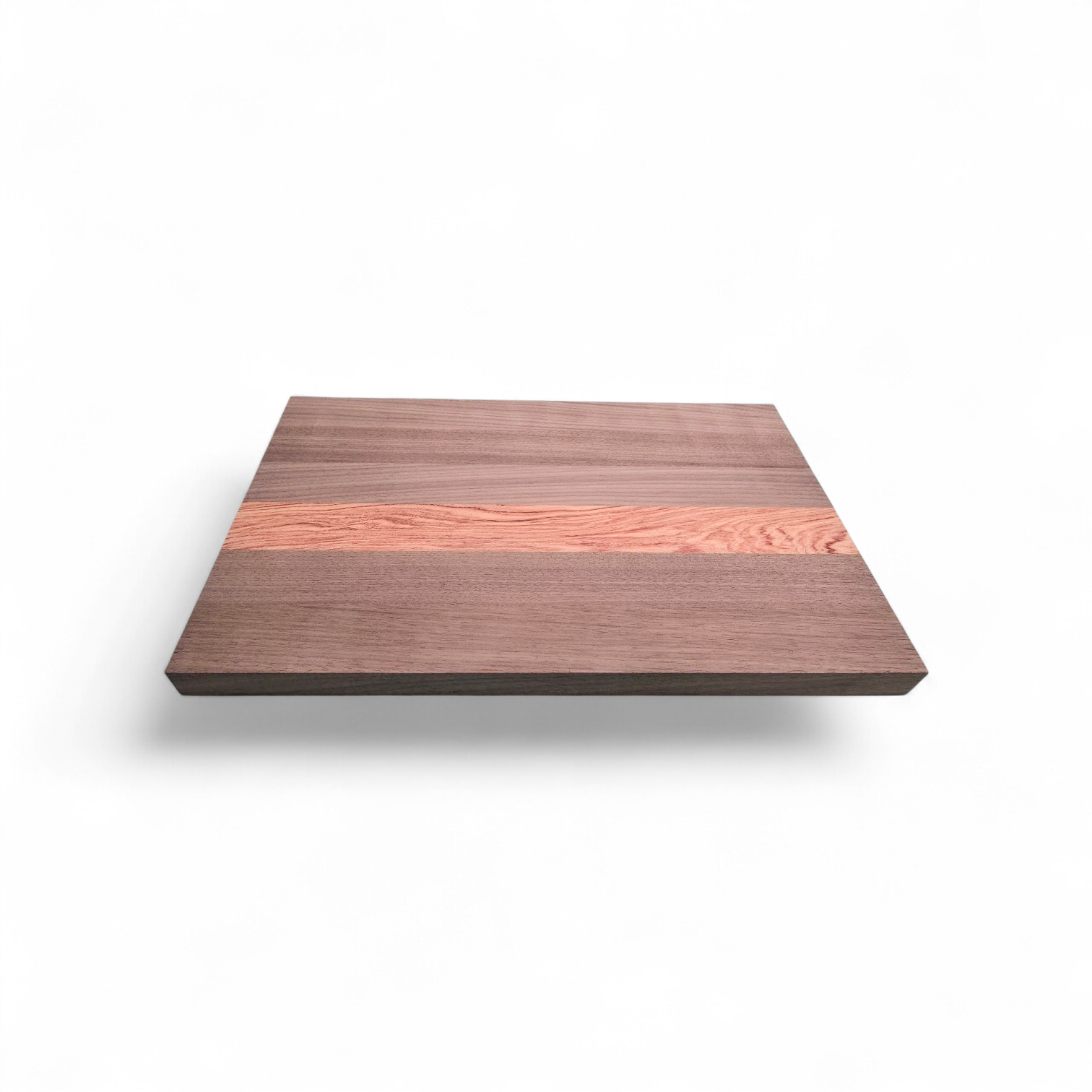 Walnut and pink ivory chopping board used for serving food and cheese